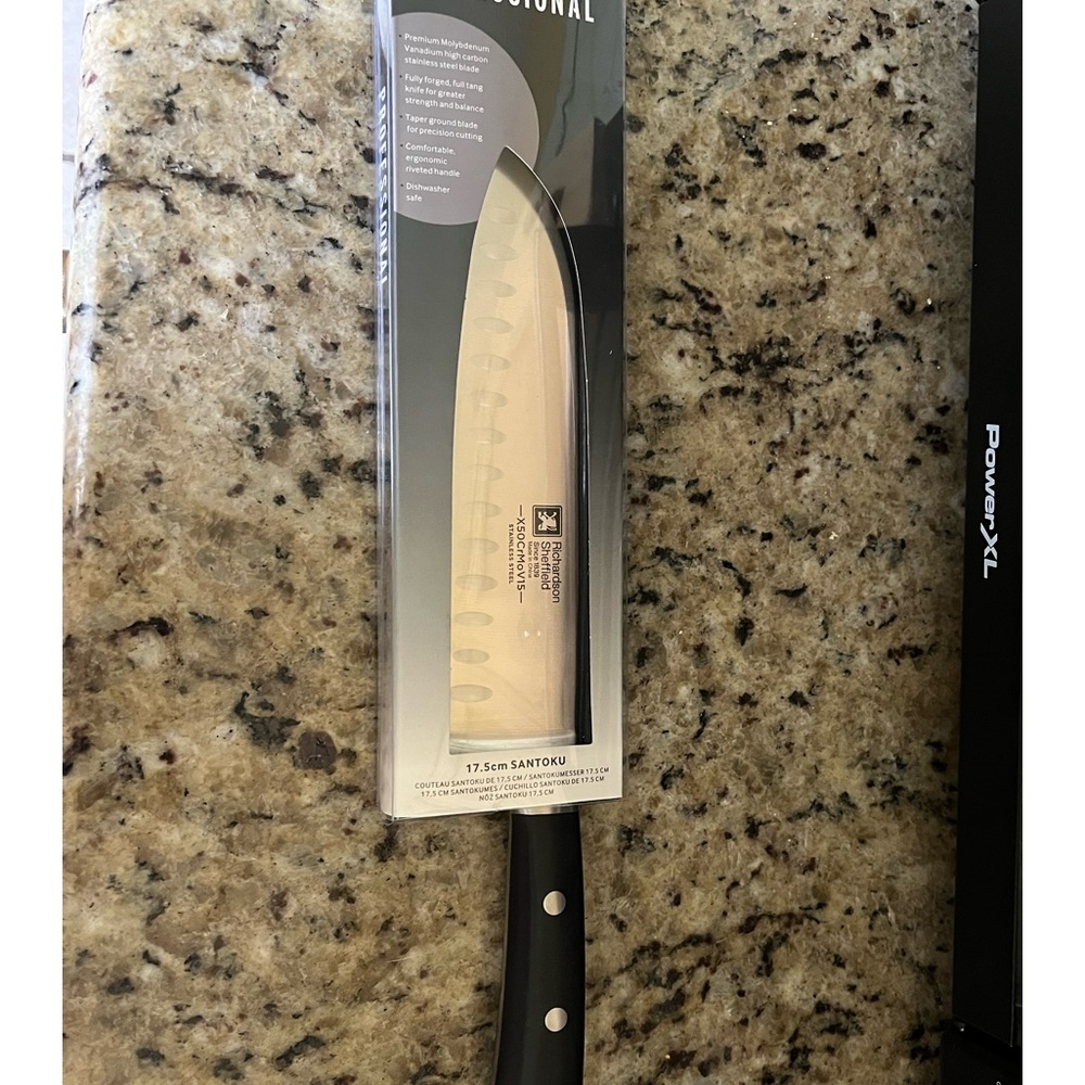 Santoku Professional Knife 17.5cm with black handle by Richardson Sheffield.